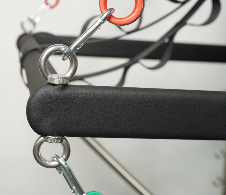 Pilates reformátor toronnyal