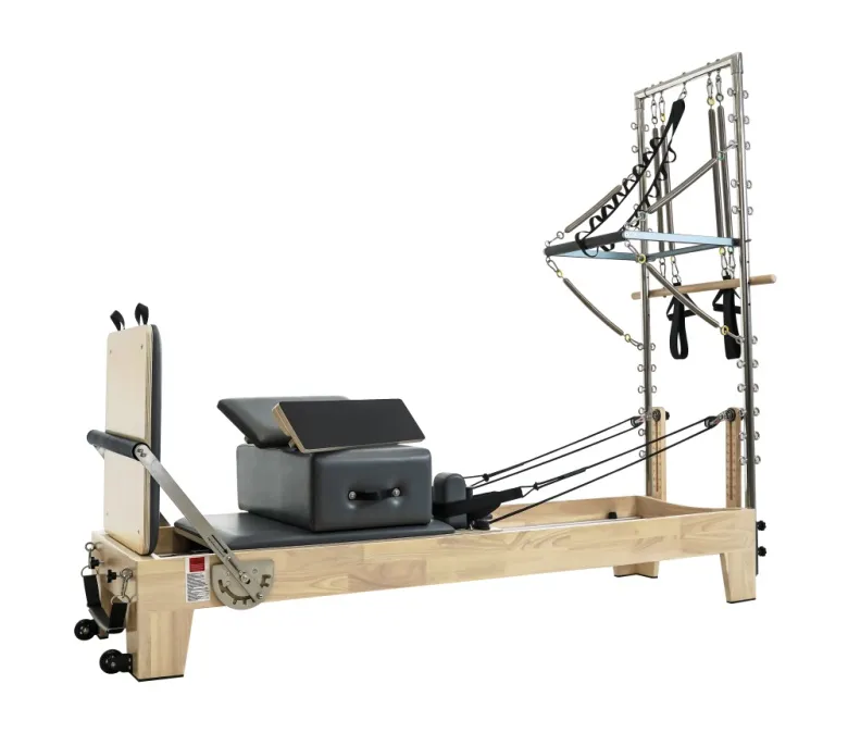 Pilates reformátor toronnyal